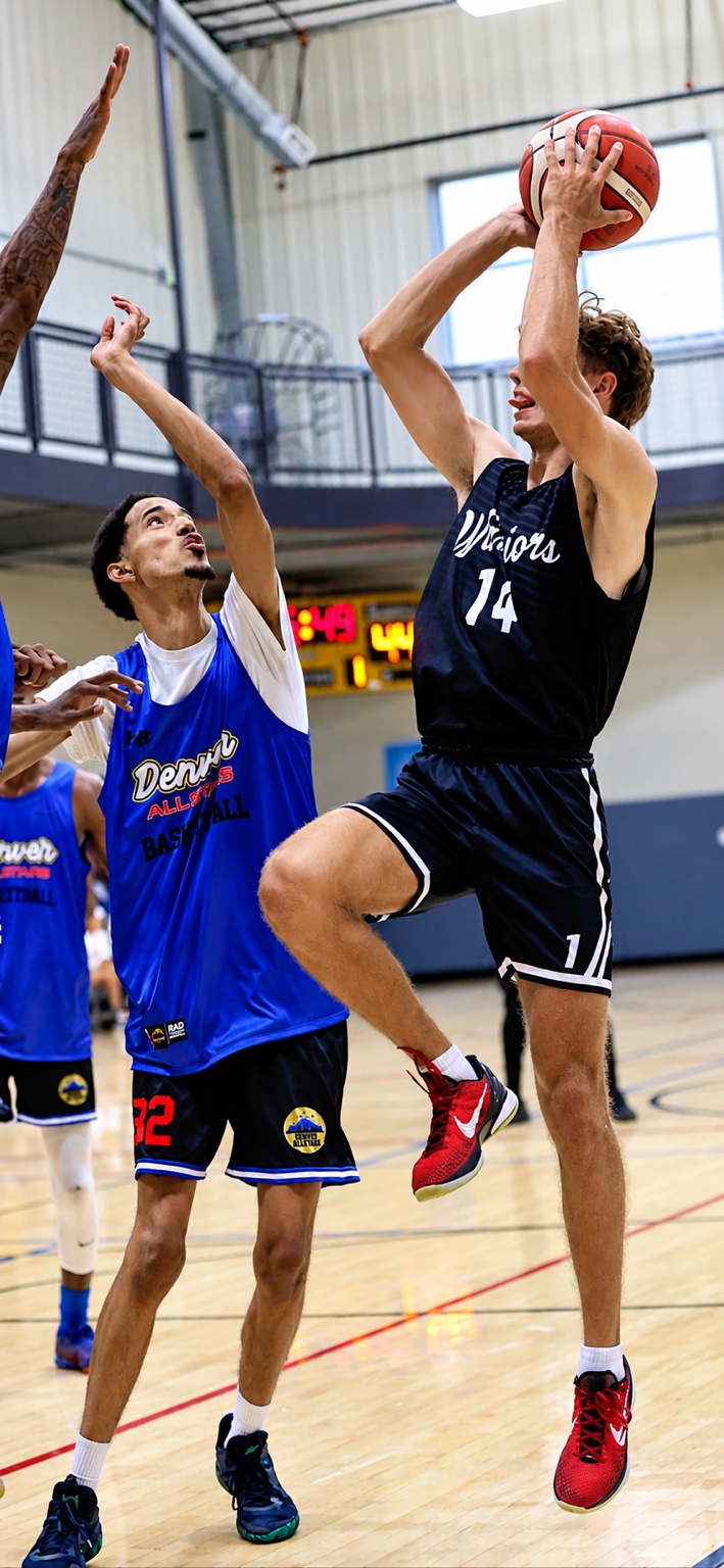 Gabe Montoya attacking the basket against the Denver Allstars